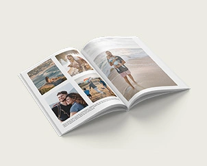 Aufgeschlagenes Softcover-Fotobuch mit Urlaubsbildern